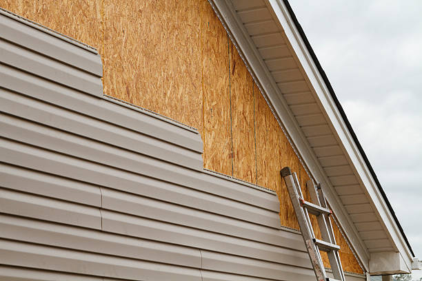 Professional Storm Damage Siding Repair technician working in Riverton, NJ